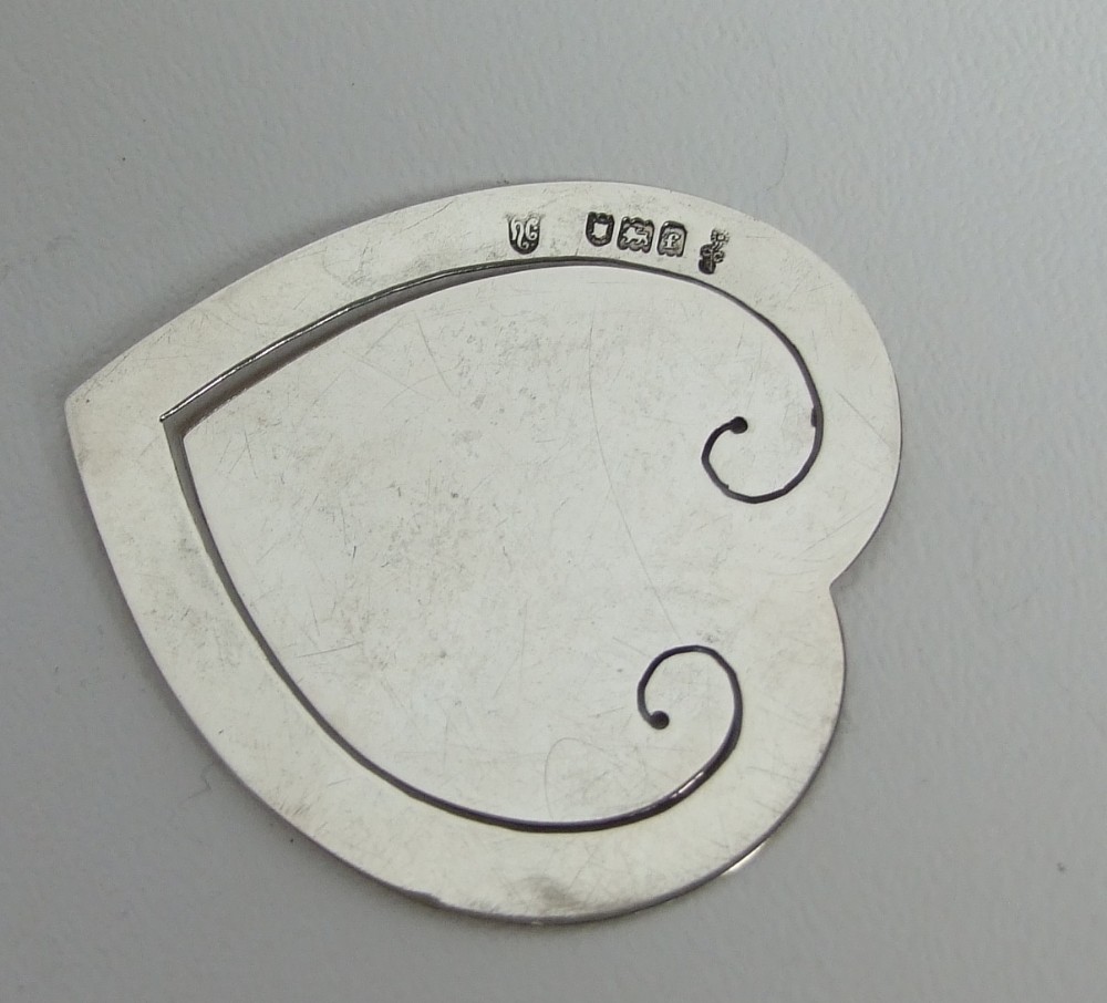 A rare Edwardian silver heart shaped bookmark.