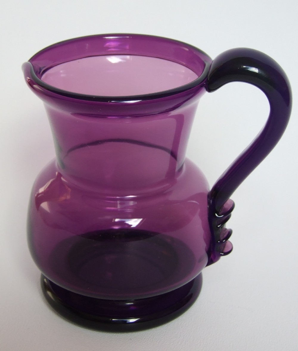 A rare early Victorian amethyst cream jug
