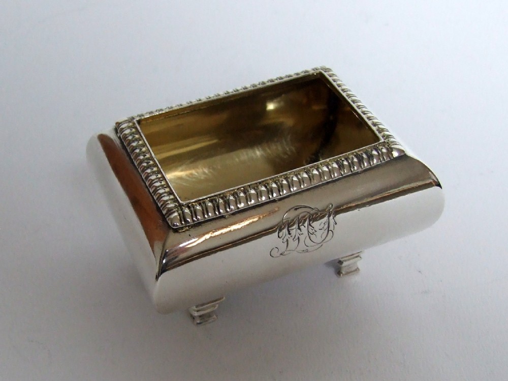 A handsome Georgian silver gilt condiment tub.