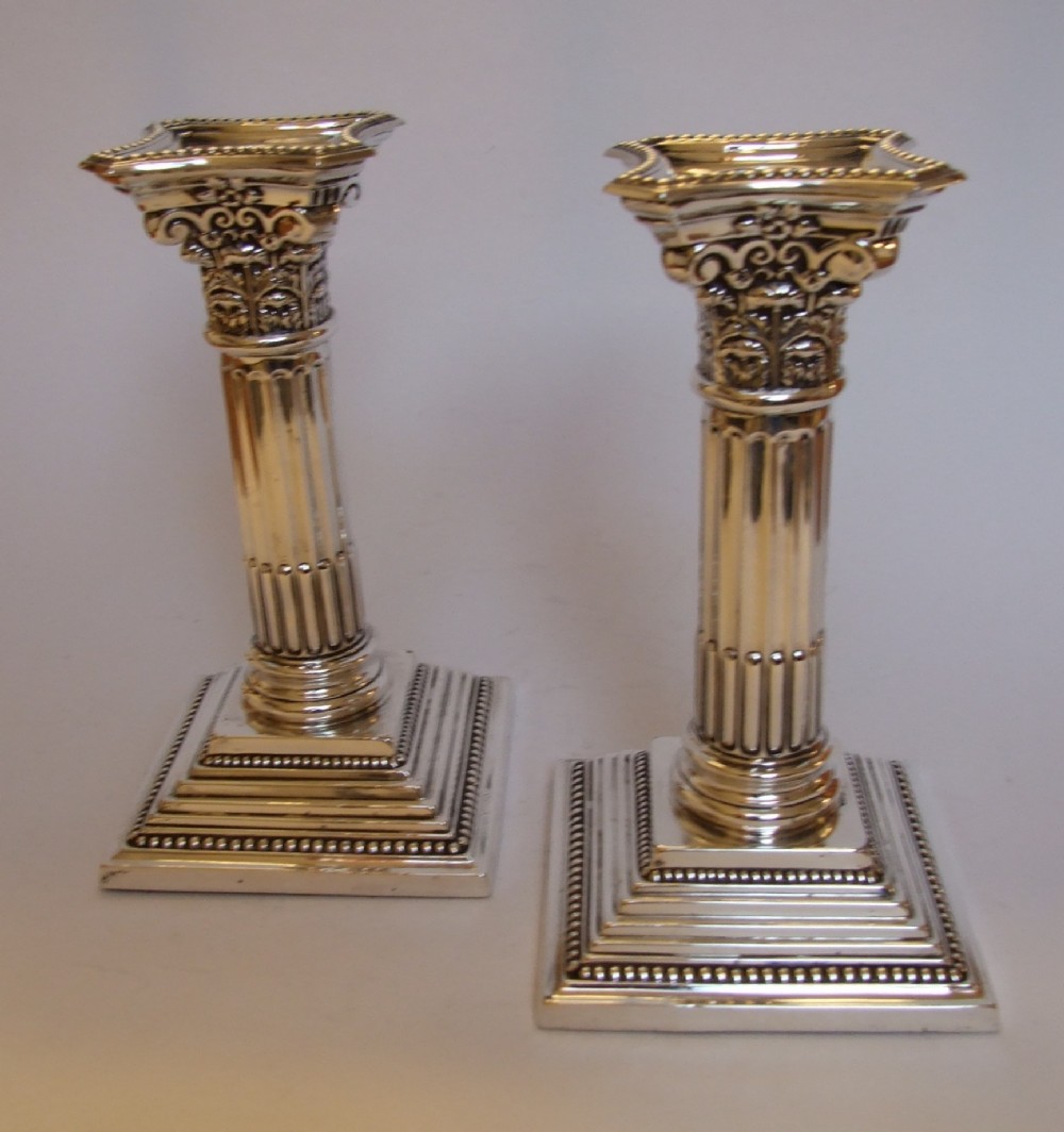 A fabulous pair of First World War silver candlesticks.