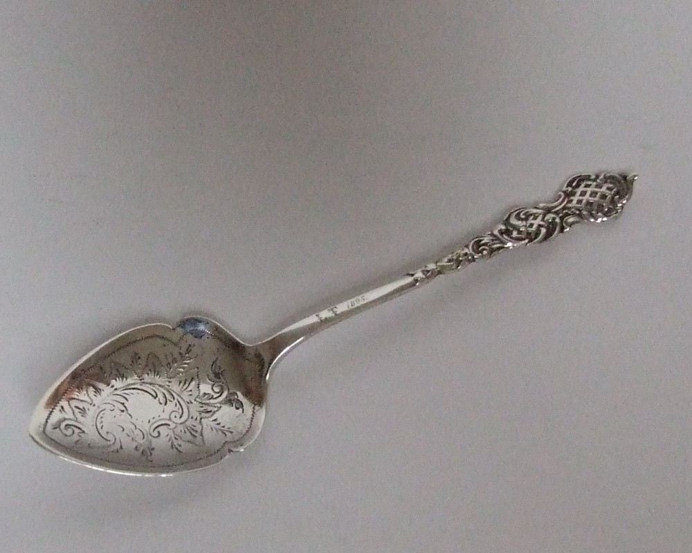 A lovely Victorian silver preserve spoon.