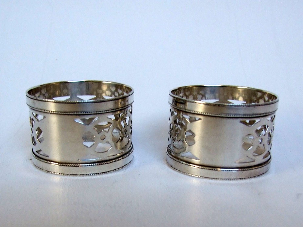 A good pair of George V pierced silver napkin rings.