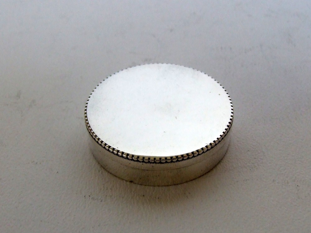 A charming silver pillbox.