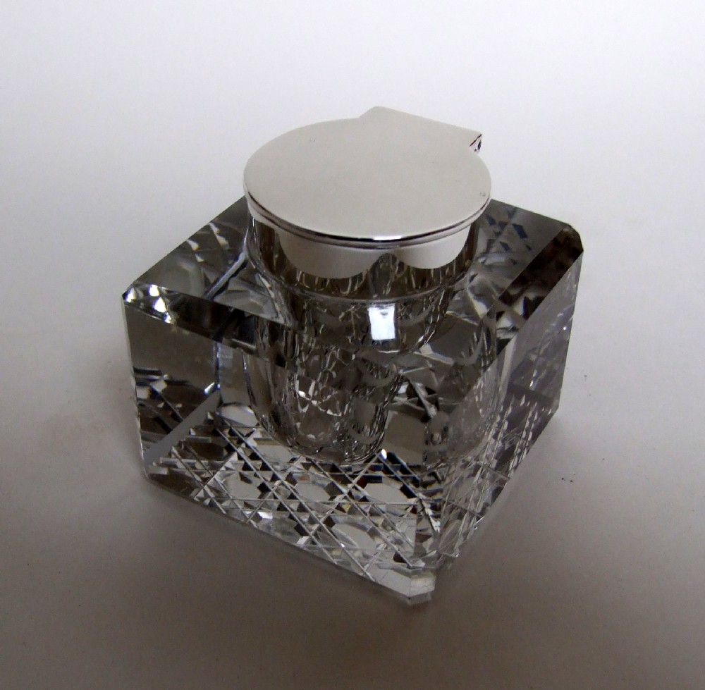 A handsome George V silver inkwell.