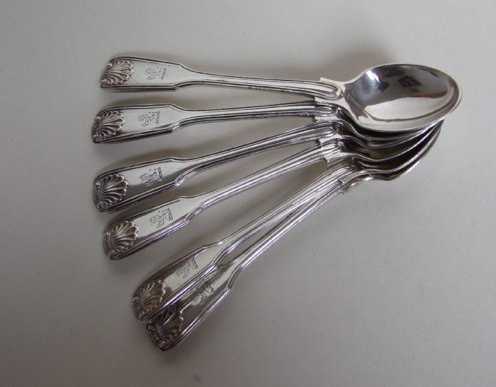 A charming set of six silver egg spoons in fiddle, thread & shell pattern.