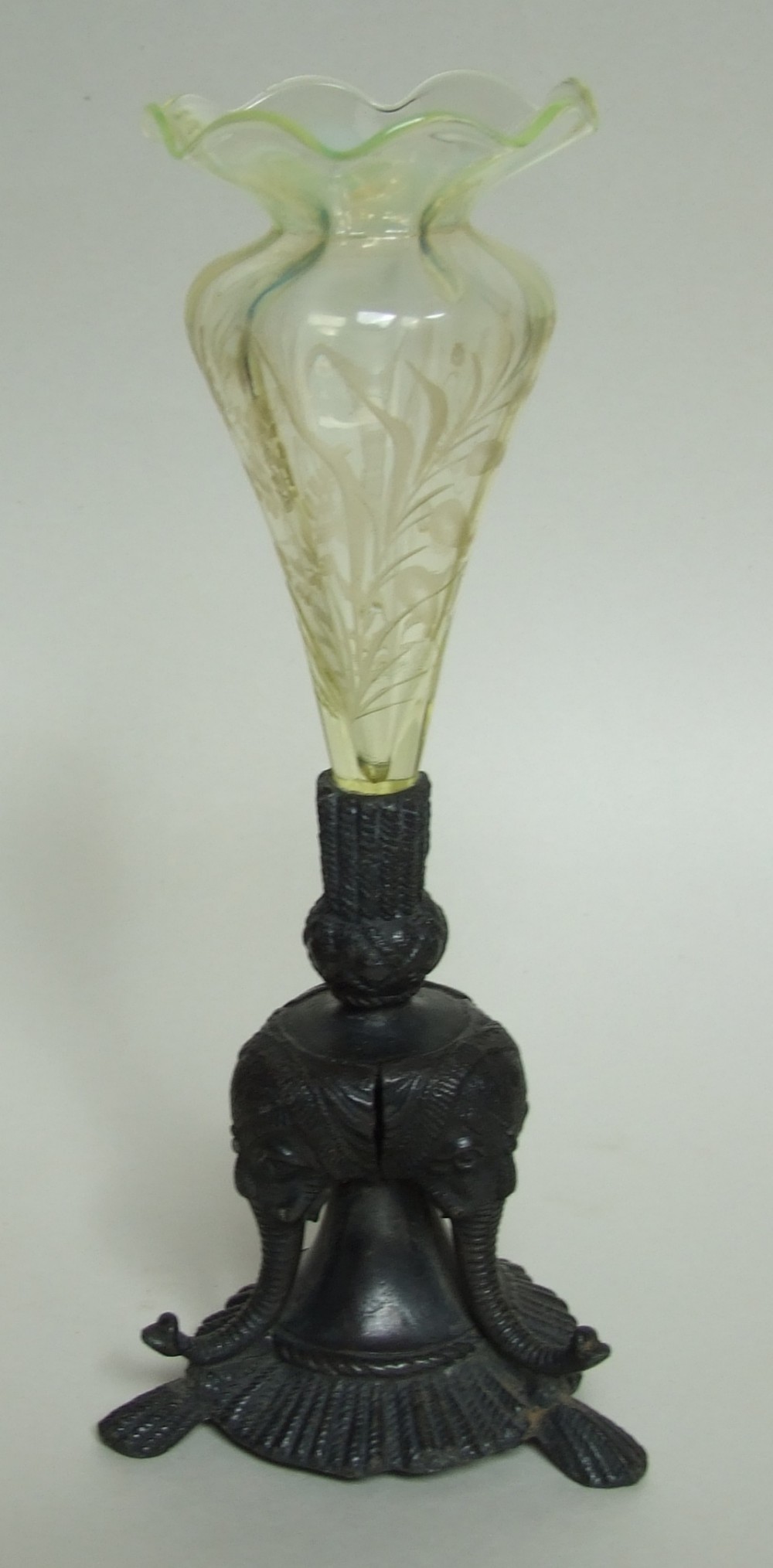 A gorgeous vaseline glass epergne with elephant base.
