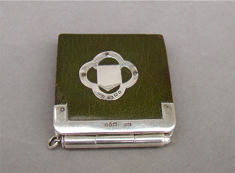 An exquisite Victorian silver mounted aide memoire/coin purse.