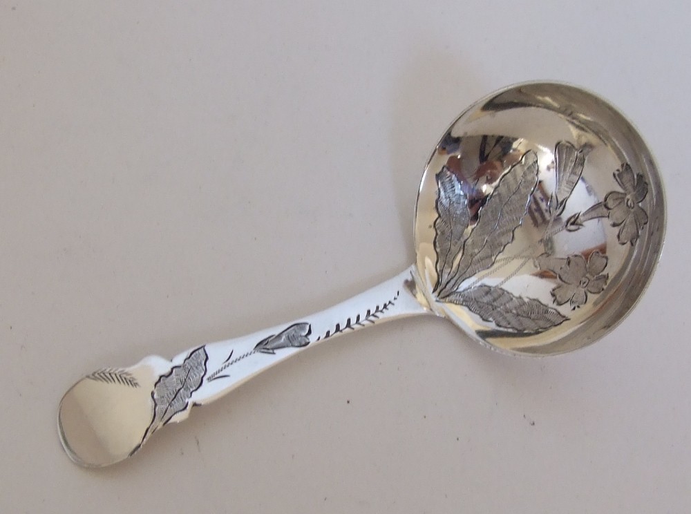 A lovely Victorian silver caddy spoon.