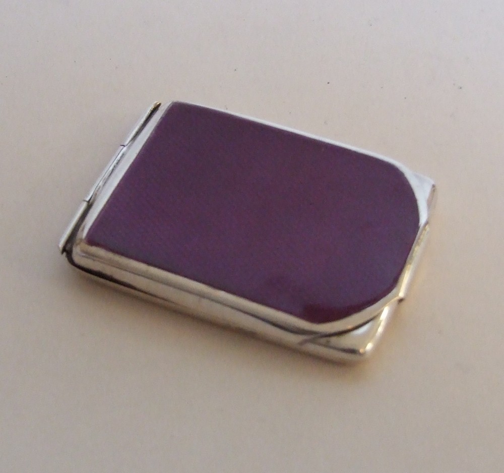A wonderful and rare amethyst enamel double sided match case.