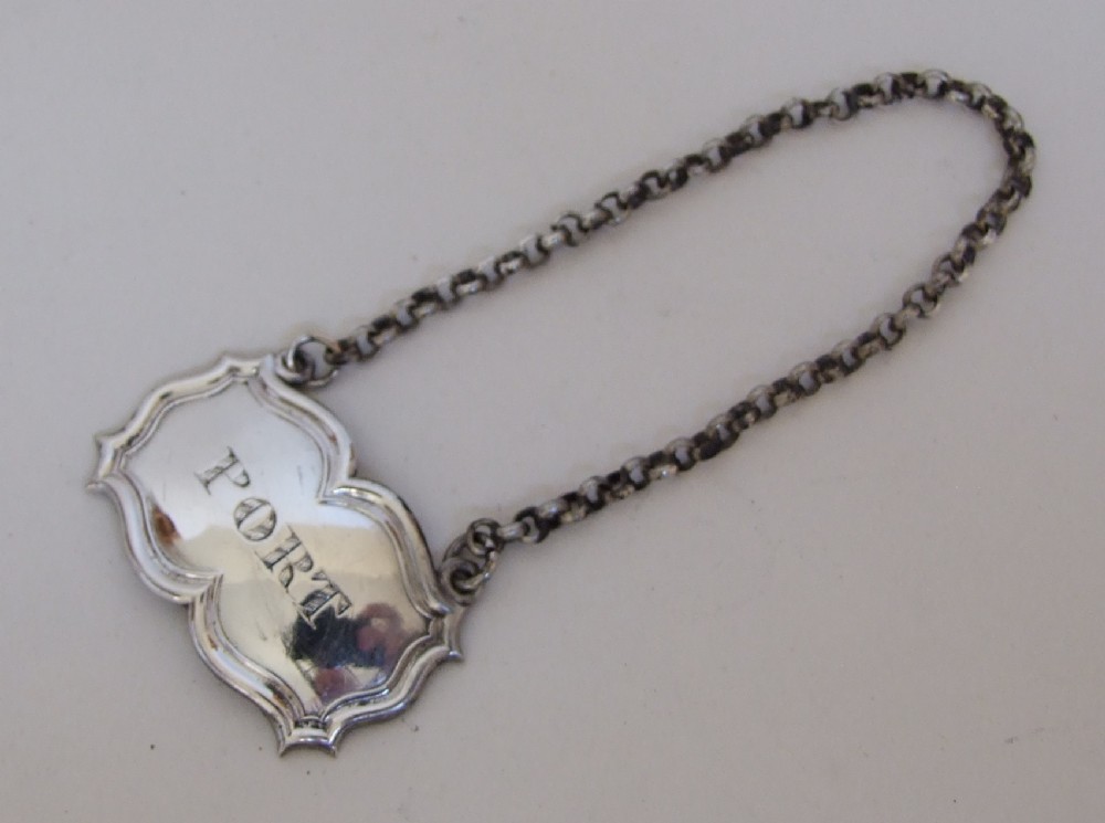 A William IV silver Port label.
