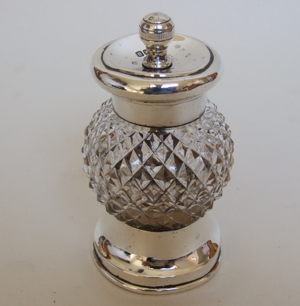A charming silver mounted pepper grinder