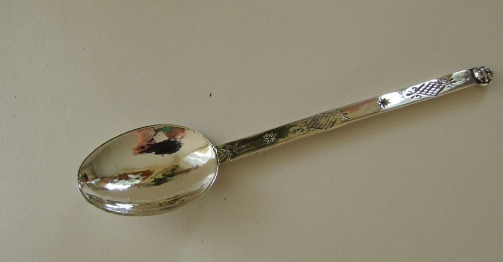 A rare Arts & Crafts silver preserve spoon. Sandheim Bros.