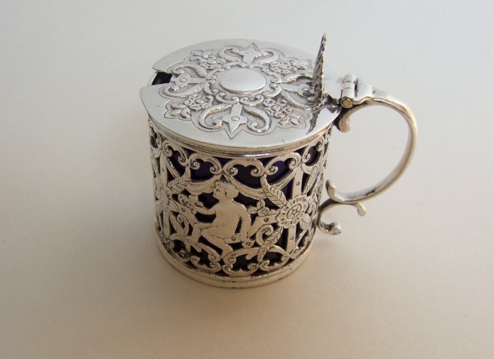 A fabulous Victorian silver pierced drum mustard pot.