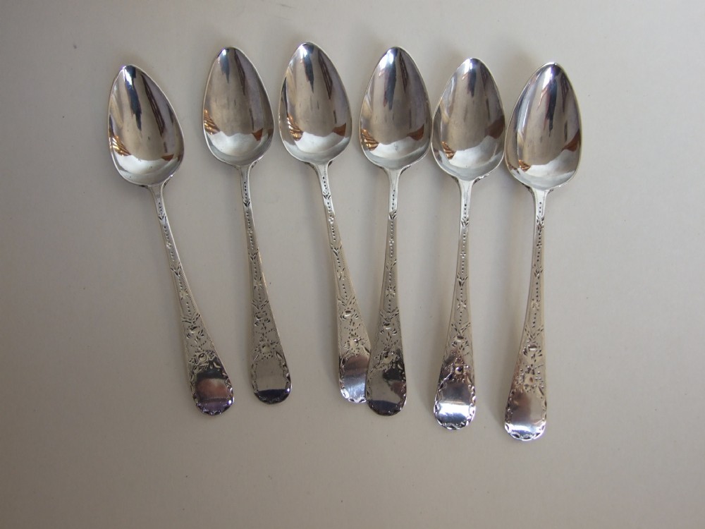 Six eighteenth Century Bright Cut silver teaspoons.