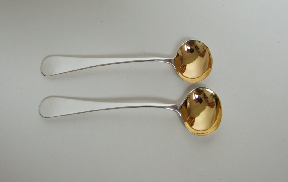 A rare pair of 18th Century Newcastle silver condiment spoons.