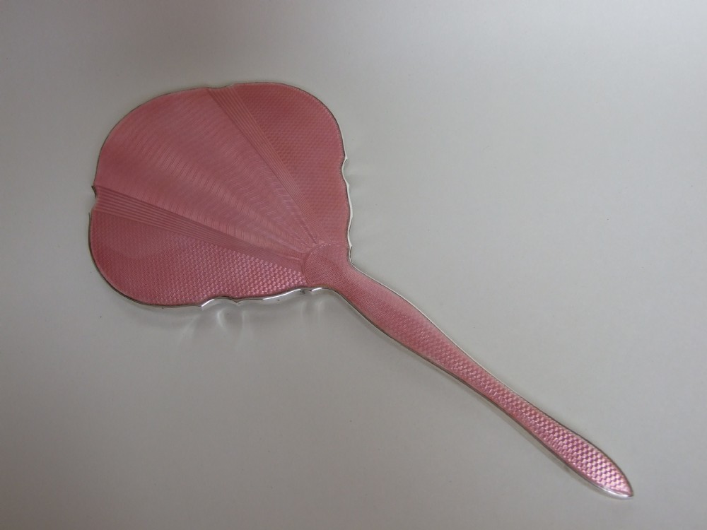 An Art Deco silver & guilloche enamel hand mirror.