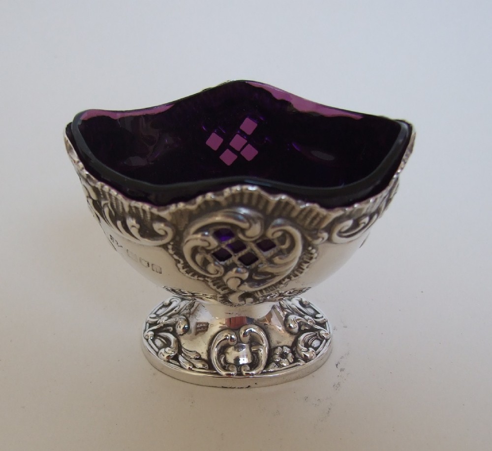 A fabulous Edwardian silver and amethyst condiment tub.