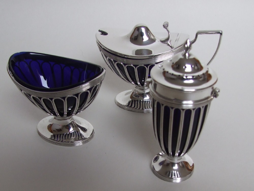 A fabulous Edwardian silver wire work cruet.