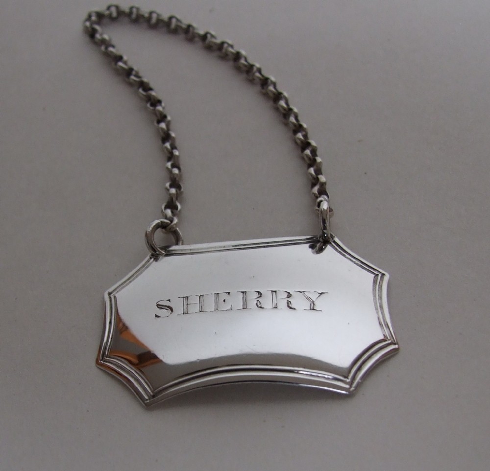 An extremely rare Newcastle Georgian silver Sherry label. Female silversmith.