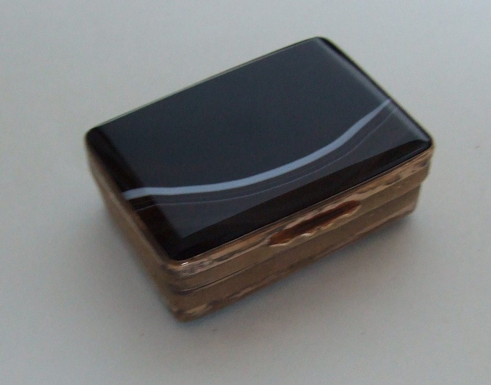 A Gorgeous Victorian banded agate and ormolu snuff box.