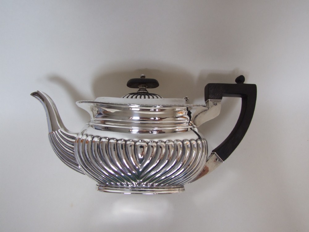 A lovely small Victorian silver teapot. Four cups capacity.