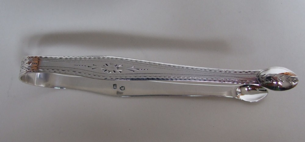 A pair of Hester Bateman silver sugar tongs.