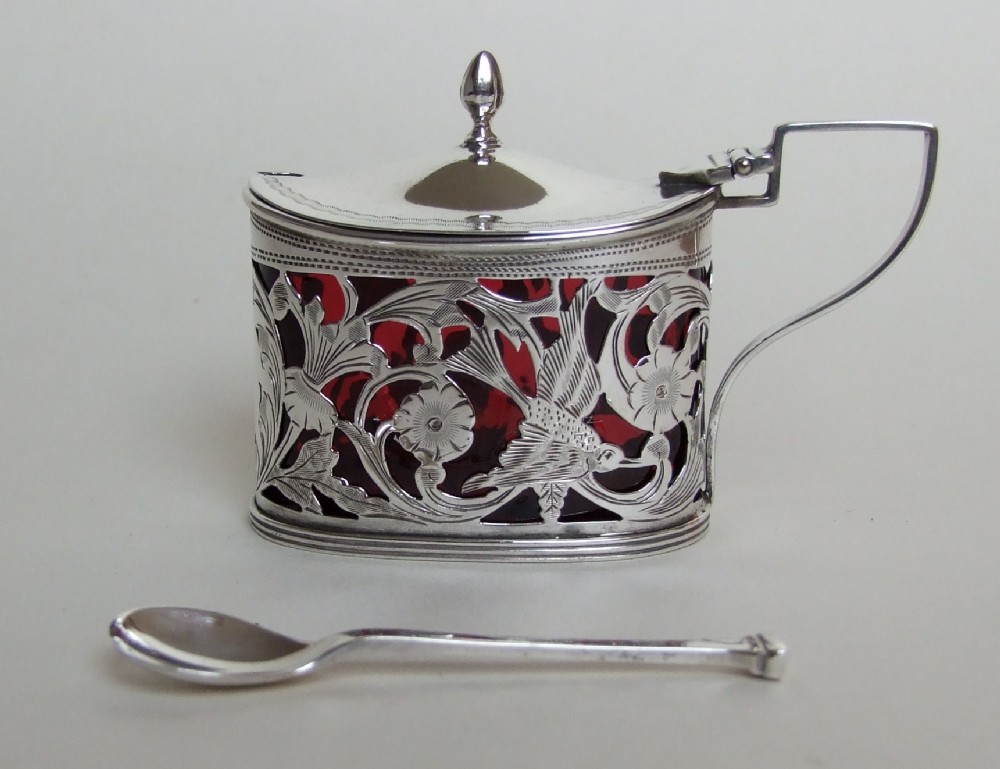 A superb Edwardian silver & cranberry mustard pot with spoon.