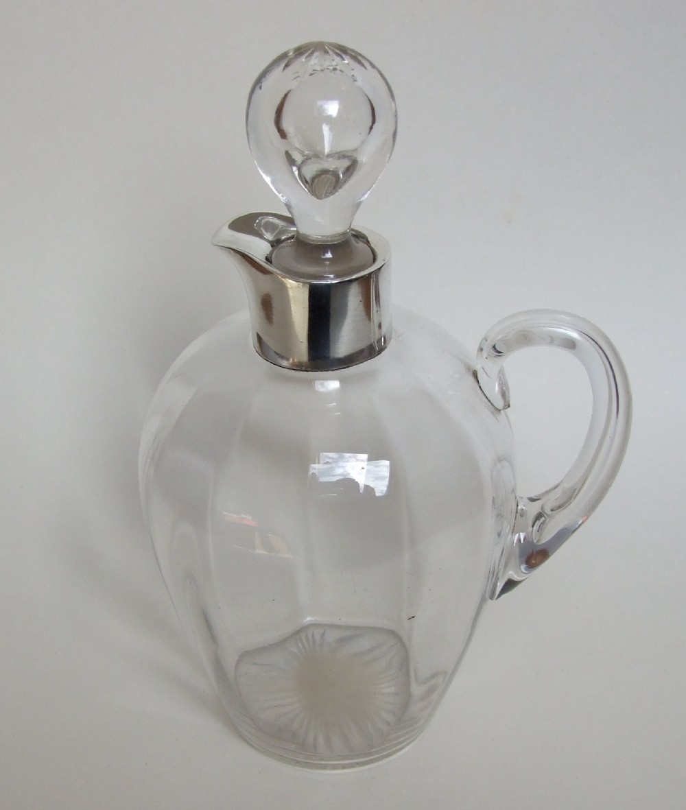  A superb silver mounted Whisky flask and stopper.