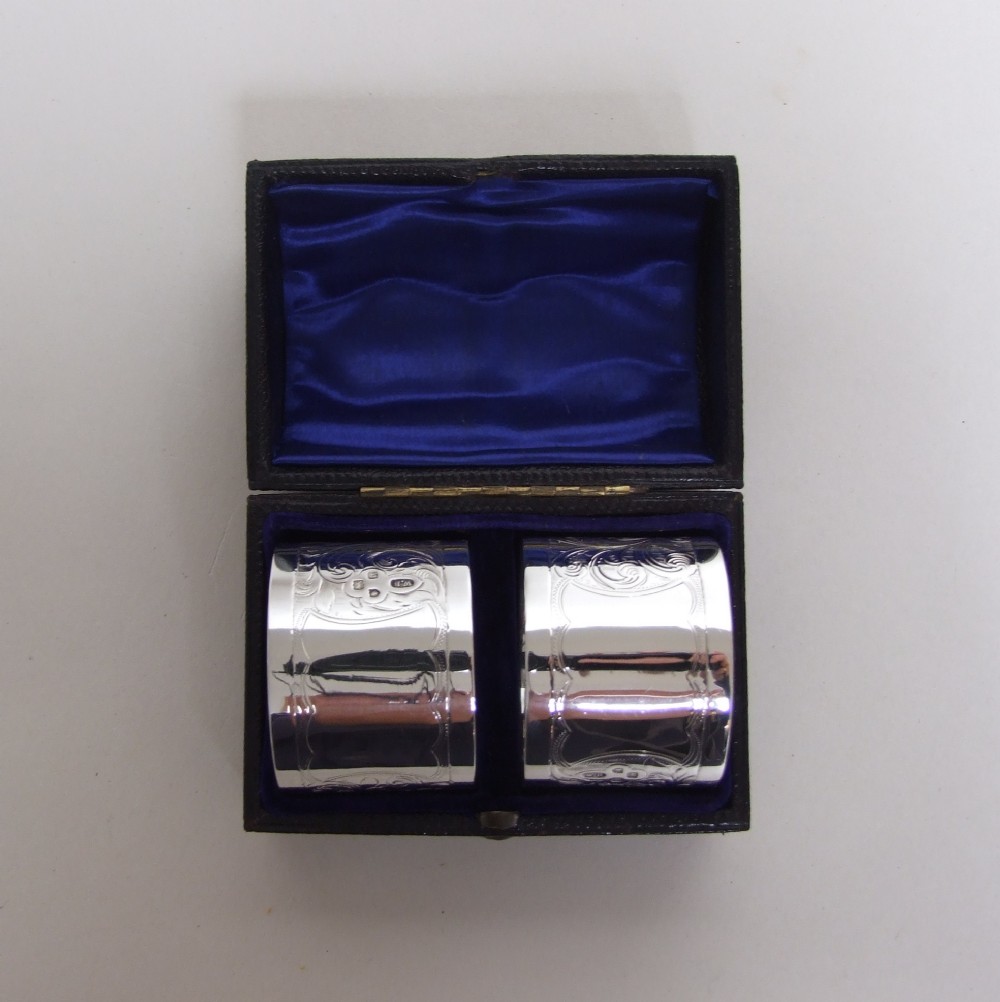 A stunning pair of boxed Victorian silver napkin rings.
