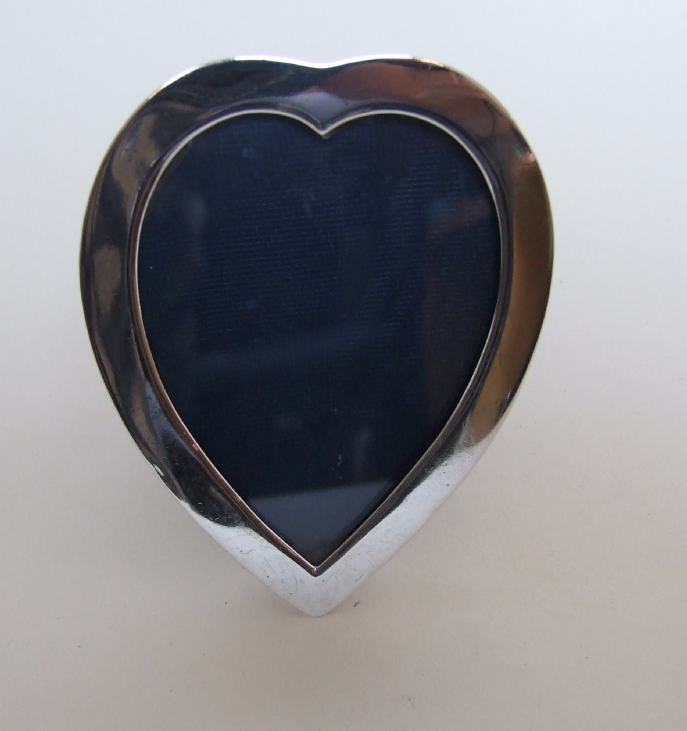 A gorgeous Victorian heart shaped silver photo frame.