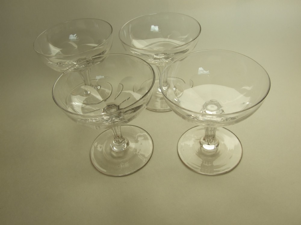 Four Victorian cut glass champagne bowls.