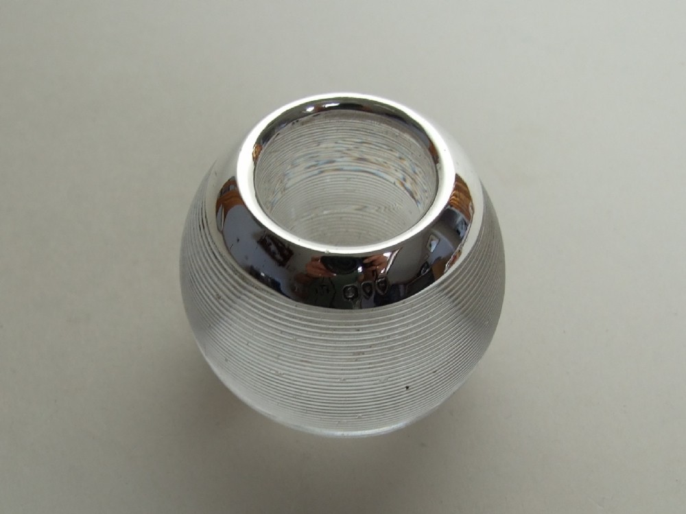 A Victorian silver mounted match striker.