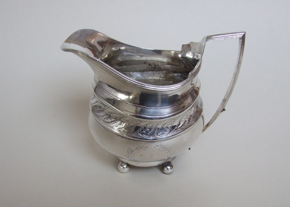 A rare Newcastle Georgian silver cream jug. Female silversmith.
