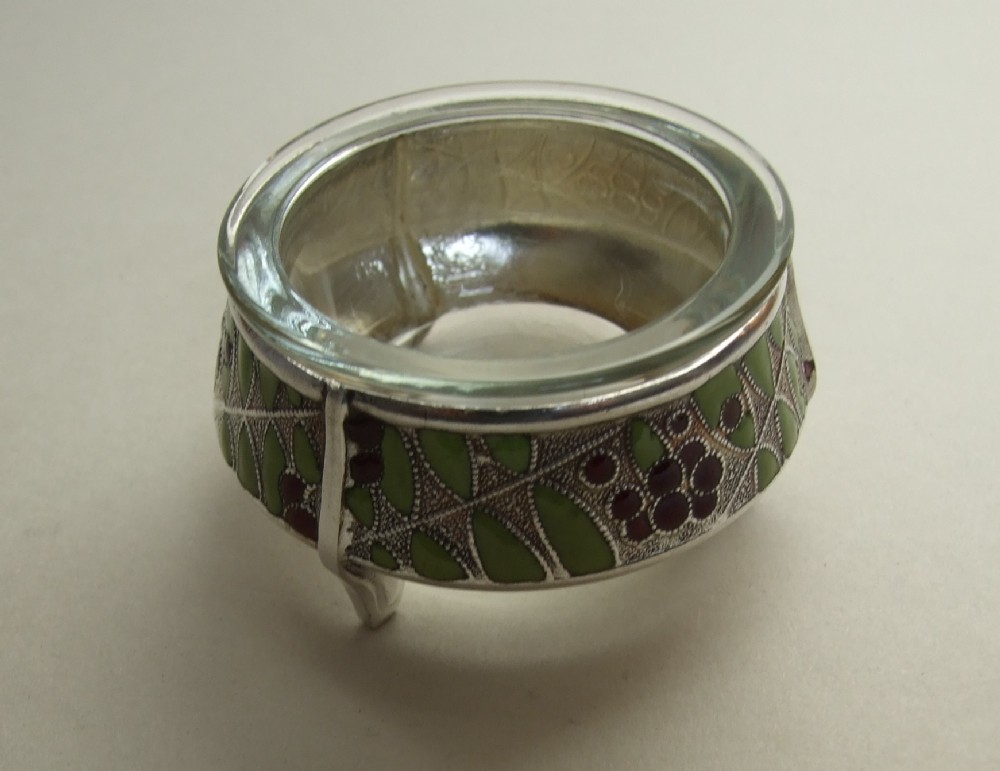 A gorgeous Russian enamel and silver plated condiment tub.