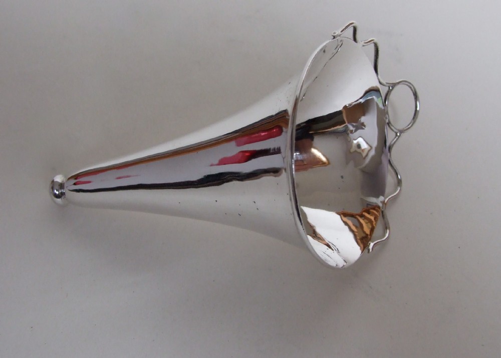 A charming George V silver posy holder.