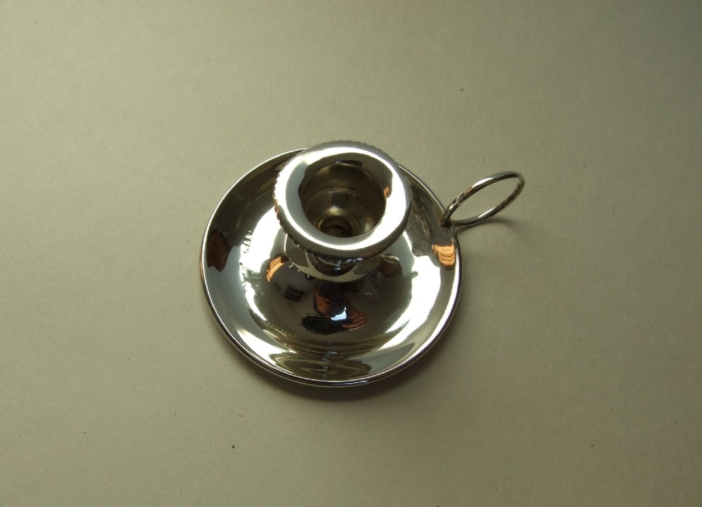 A charming miniature silver go-to-bed.