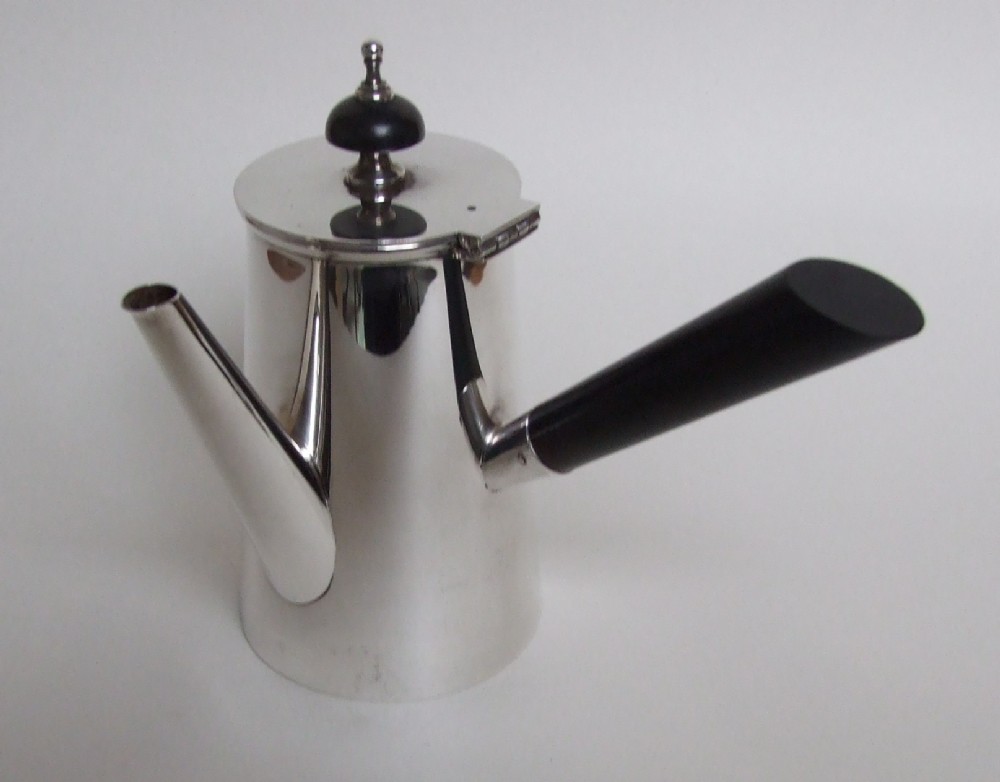 A gorgeous George V silver solo silver chocolate pot.