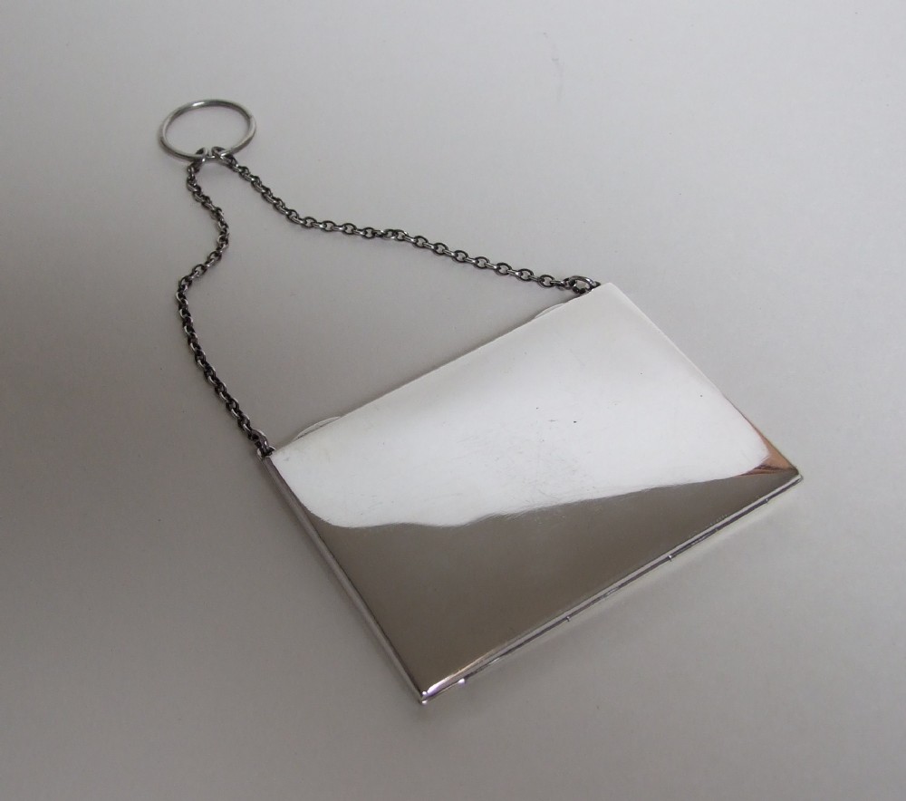 An elegant silver sprung mechanism card case,from the First World War period.