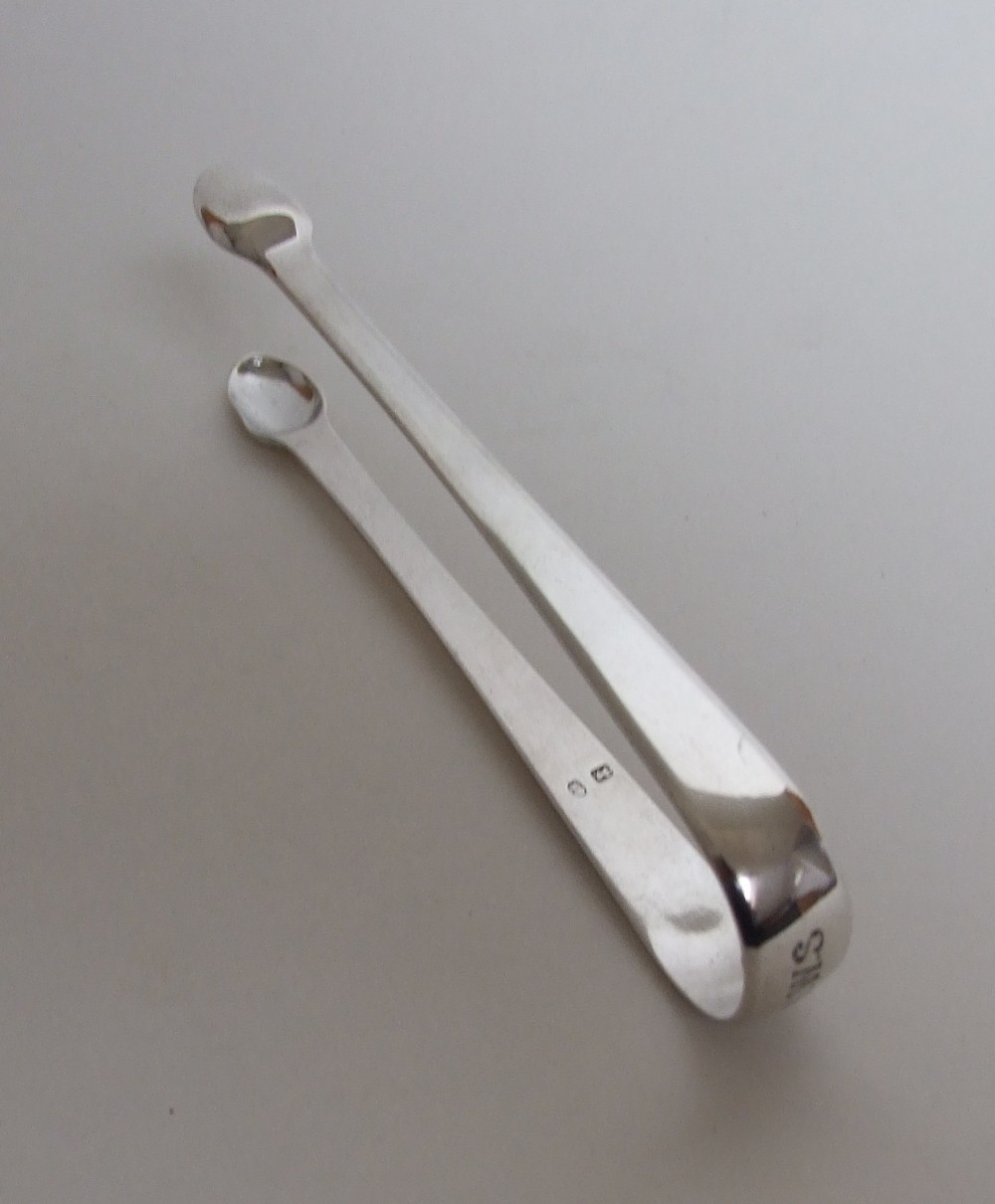 A extremely rare pair of York silver tongs.