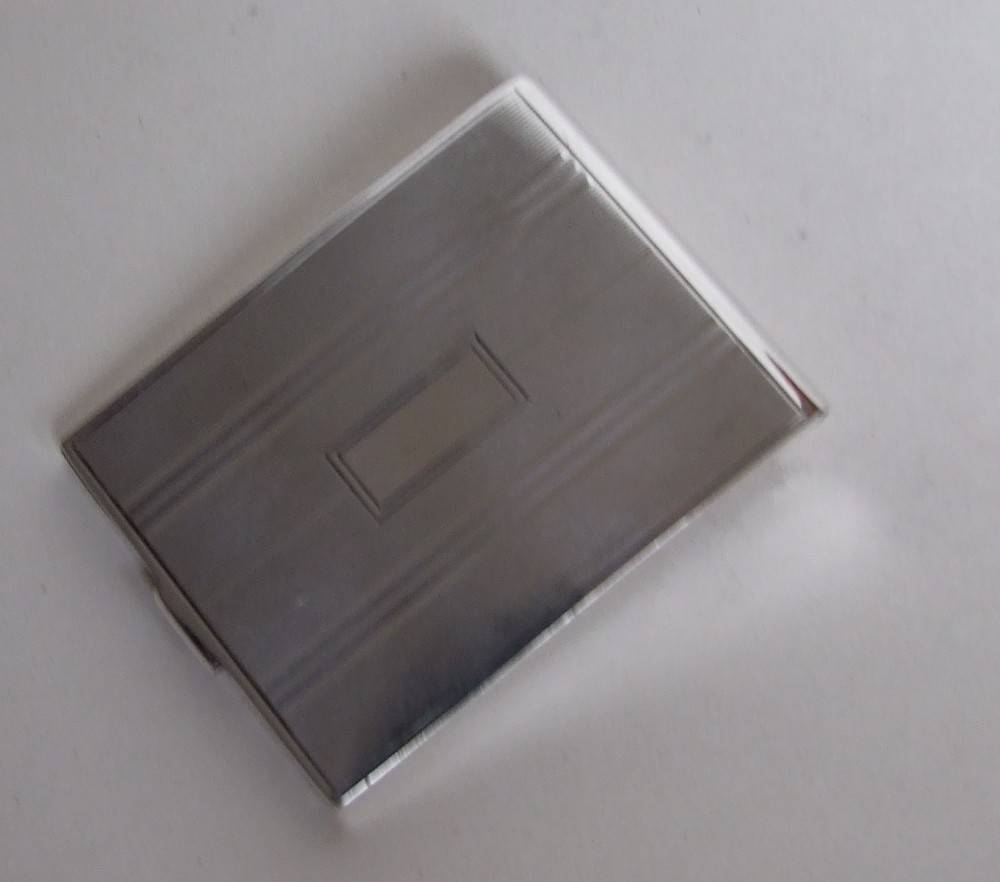 A Sterling silver Art Deco match case holder.