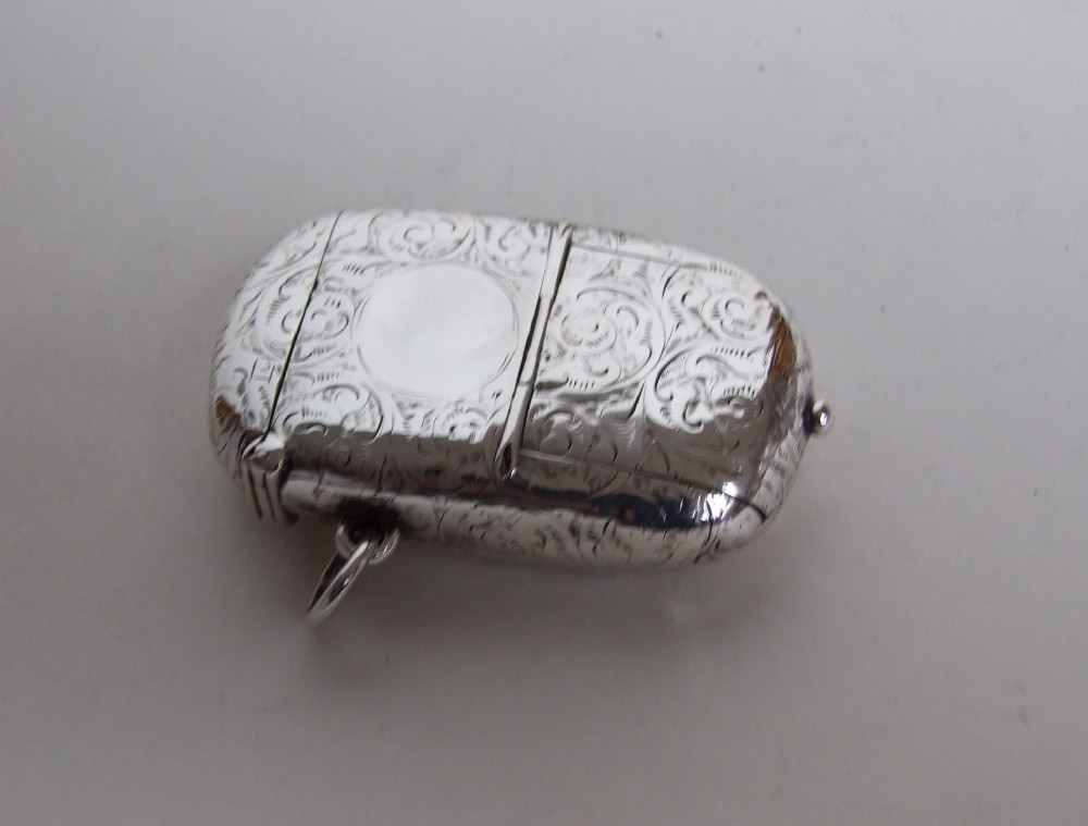 A rare Victorian silver vesta/soverign case/stamp case combi.