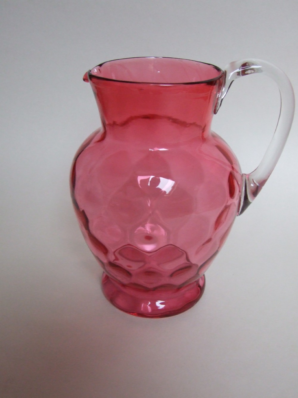 A handsome Victorian cranberry jug.
