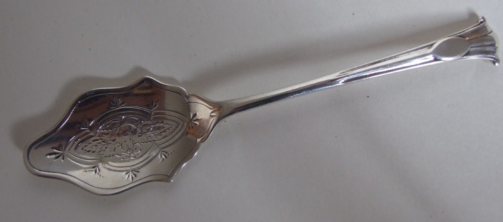 A splendid silver Onslow pattern preserve spoon.