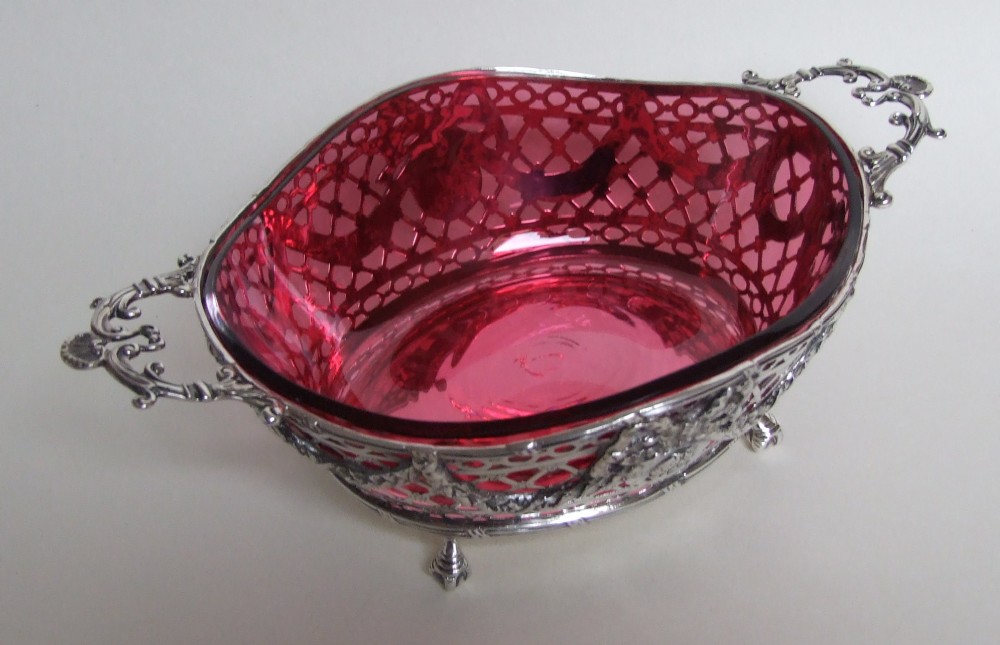 A magnificent Victorian silver & cranberry basket.