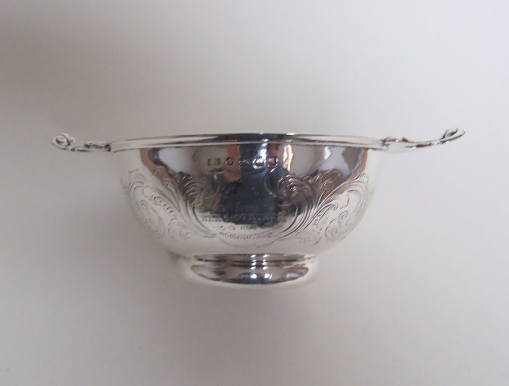 A superb Victorian silver quaiche.