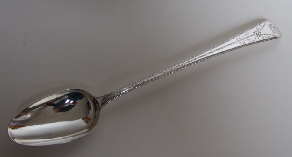 A fabulous 18th Century silver stuffing/basting spoon.