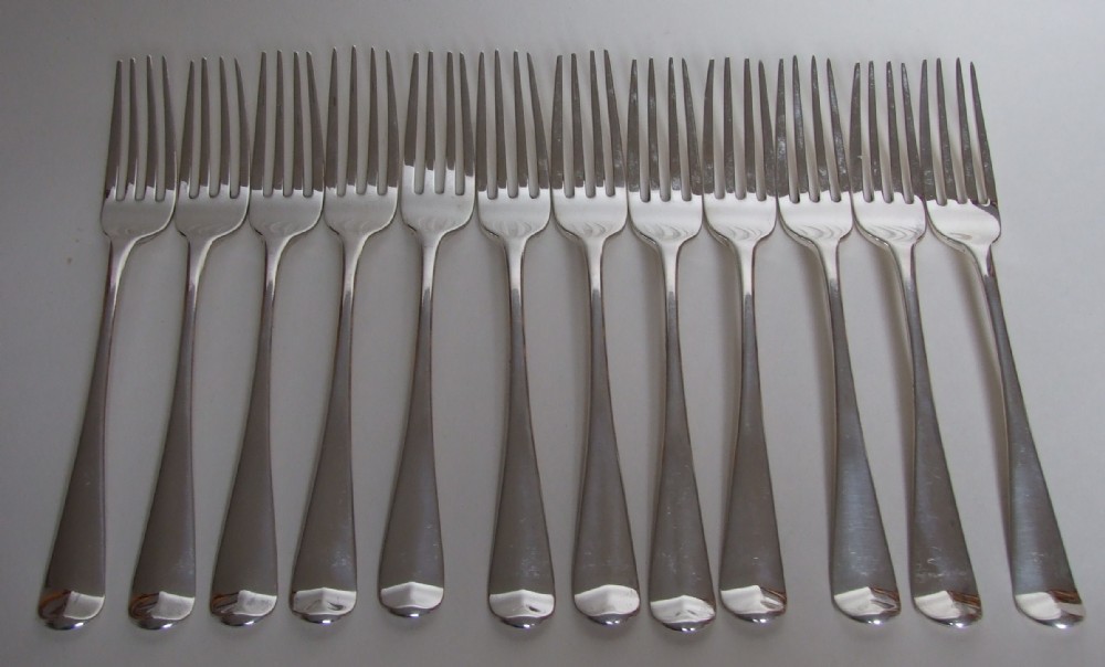 An outstanding set of twelve 18th Century silver dinner forks.
