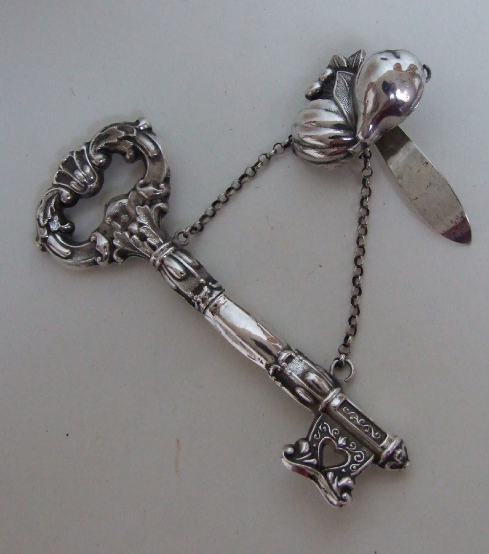 A rare Dutch silver novelty needle case shaped as a key.