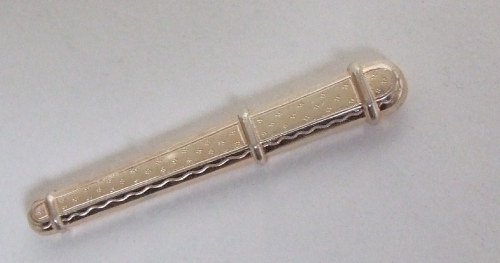 A gorgeous French silver gilt needle case with matching bodkin.