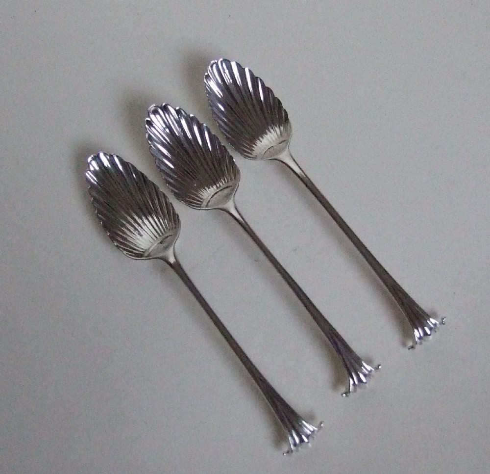 A rare set of three George II silver Onslow pattern teaspoons.